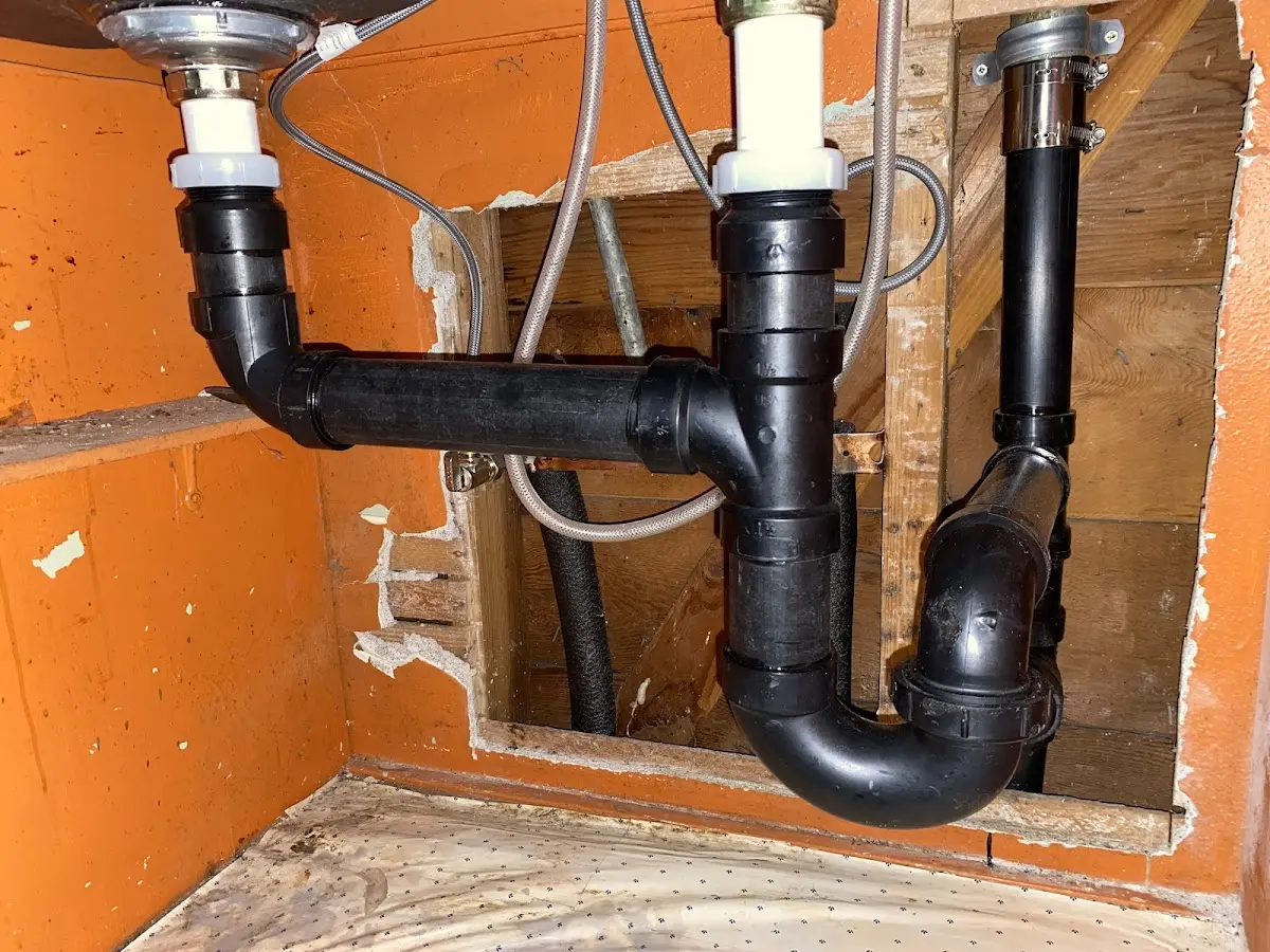 Professional Garbage Disposal Repair equipment and tools on the job in Hampton